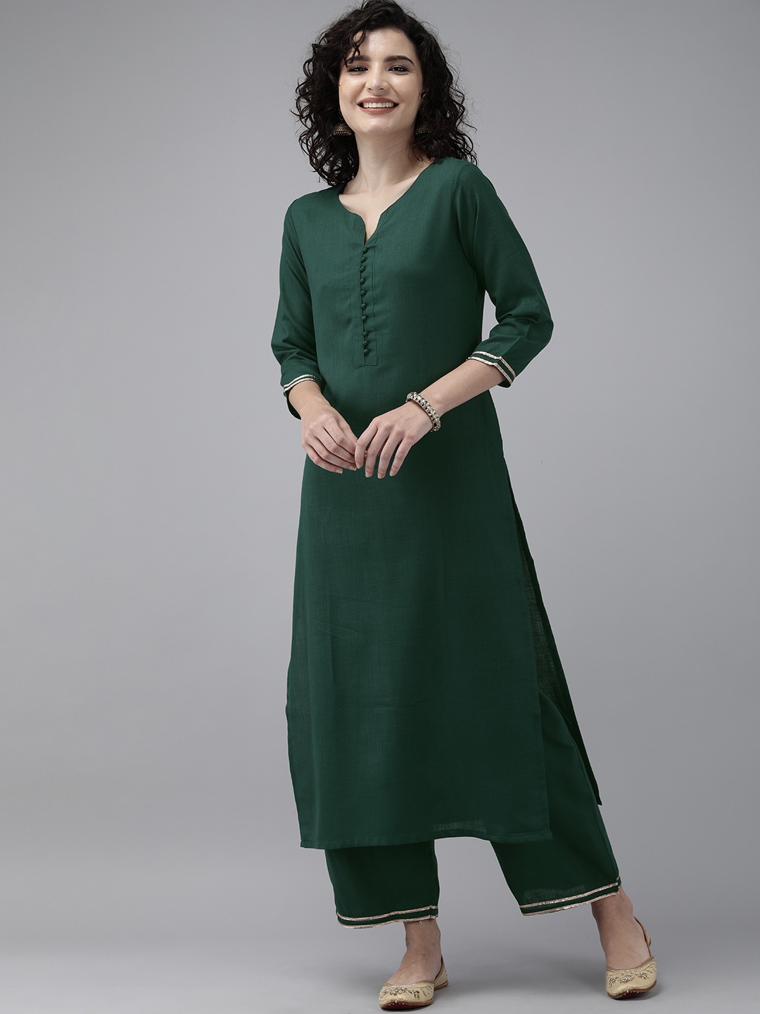 

Indo Era Women Green Solid Kurta with Palazzos