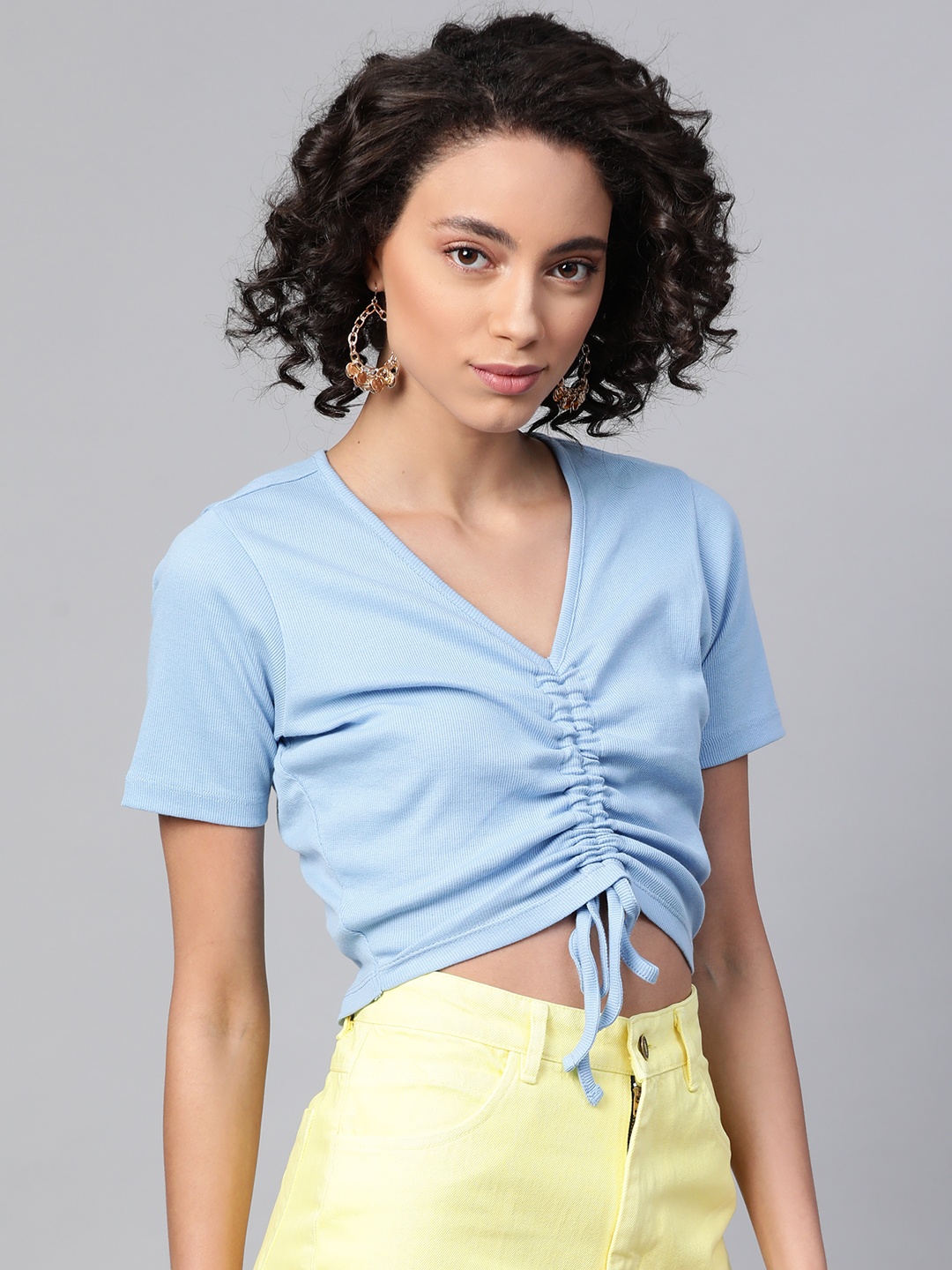 SASSAFRAS Whimsical Blue Solid Smocked Crop Top