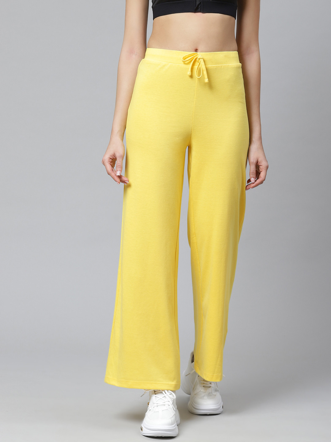 

Hubberholme Women Yellow Solid Track Pants