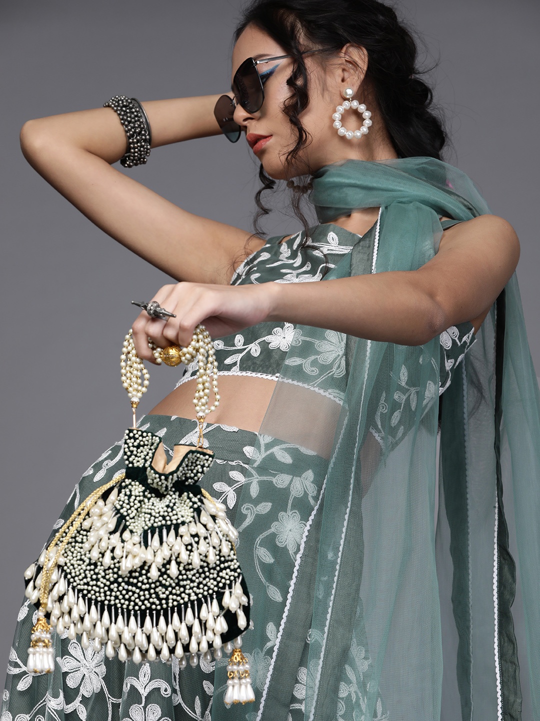 

Inddus Women Green & White Embroidered Top with Ruffled Skirt & Net Dupatta