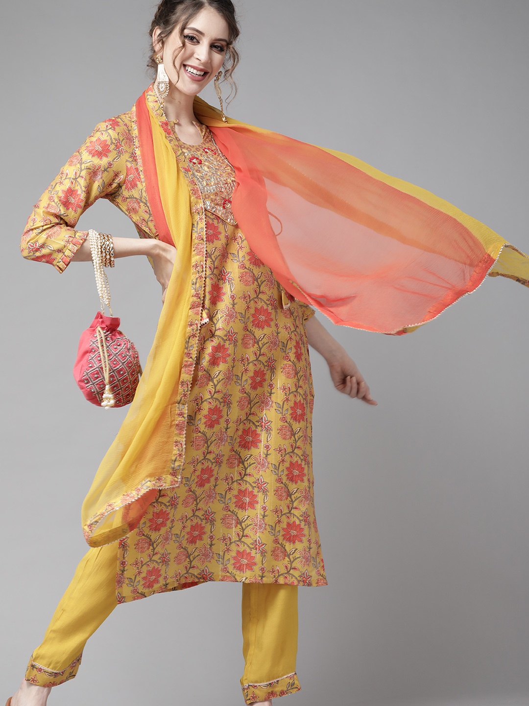 

Ishin Women Mustard & Orange Printed Kurta with Trousers & Dupatta