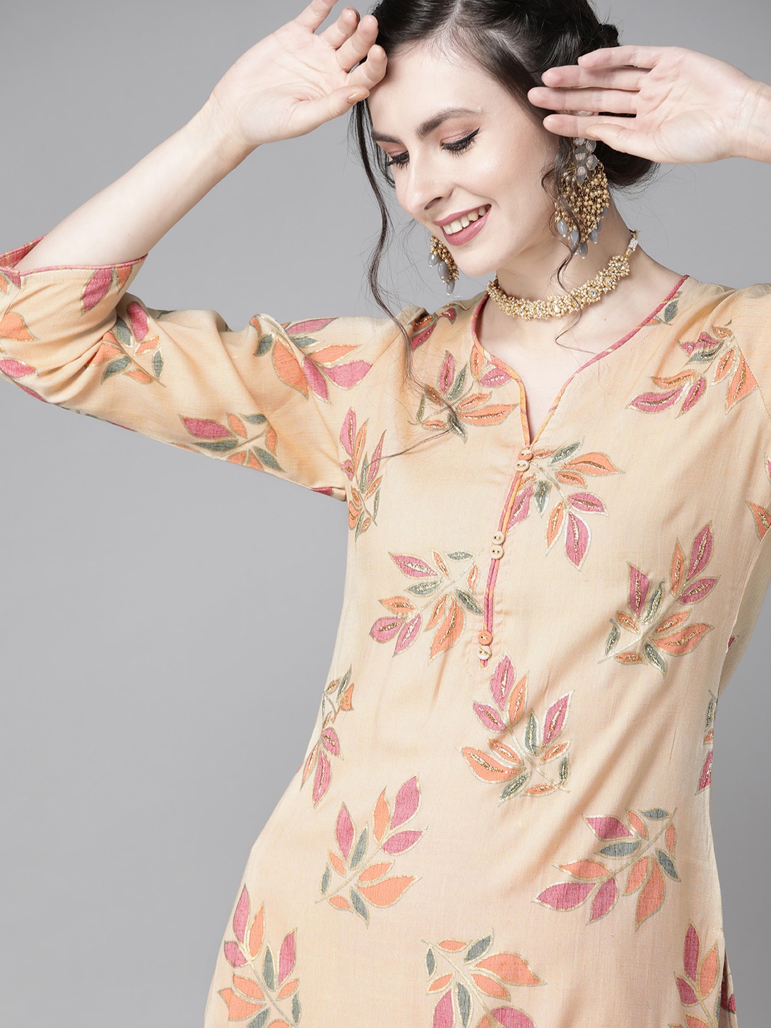 

Ishin Women Beige & Red Embroidered Kurta with Trousers