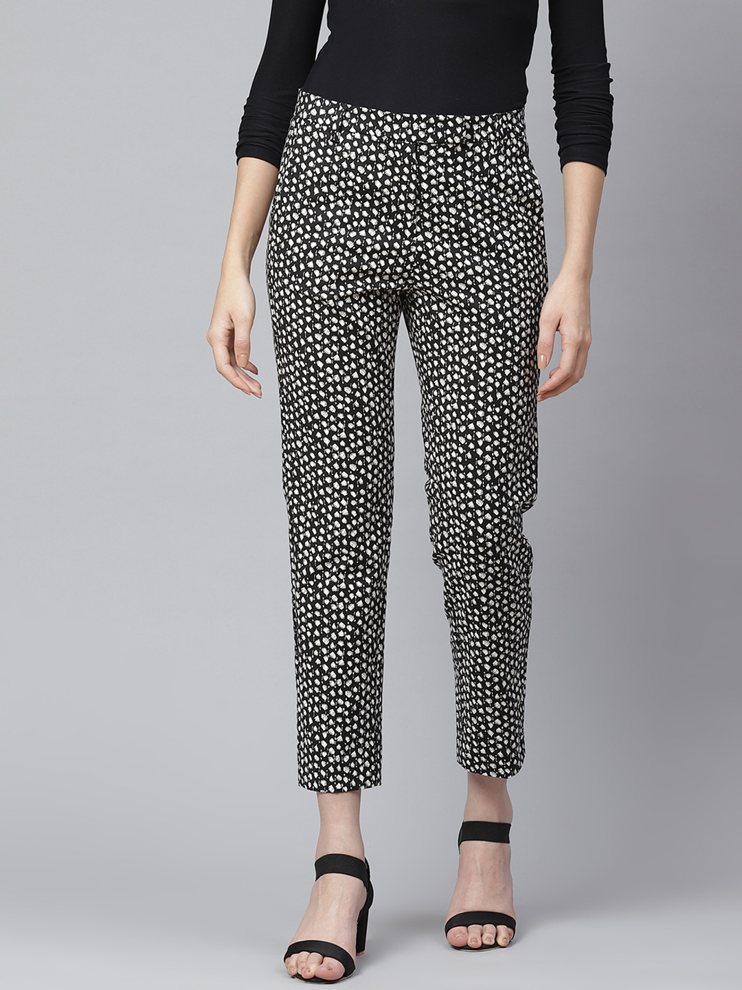 

Marks & Spencer Women Black & White Printed Casual Trousers