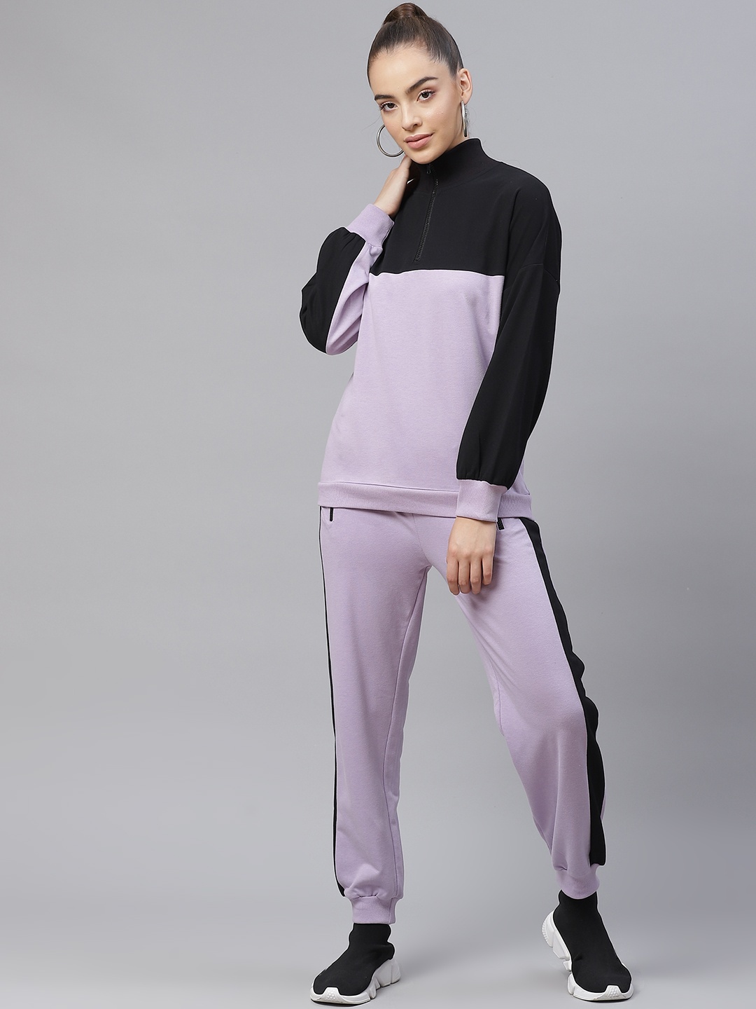 

Laabha Women Purple & Black Colourblocked Tracksuit