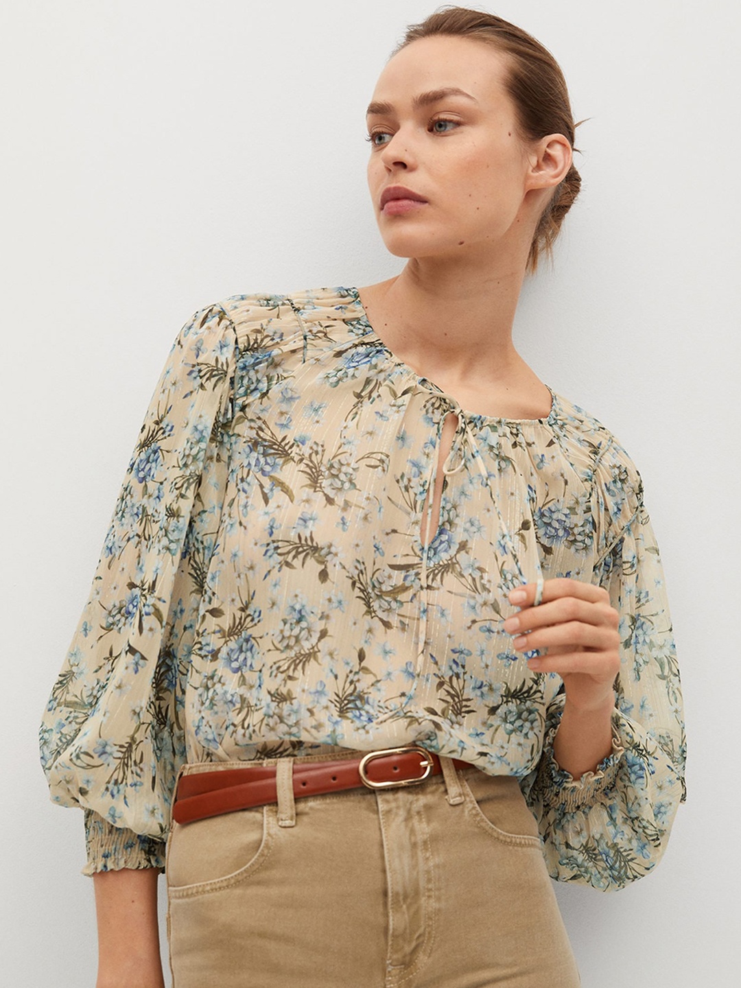

MANGO Cream-Coloured & Blue Floral Printed Tie-Up Neck Puff Sleeves Regular Top