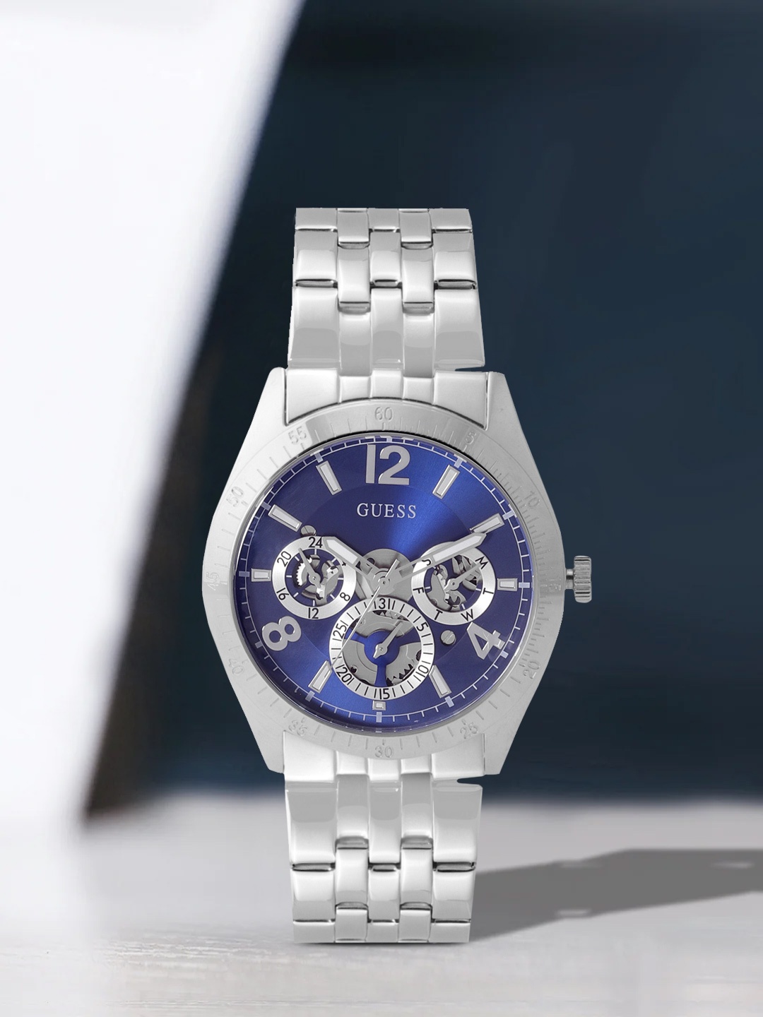 

GUESS Men Blue Skeleton Dial & Silver-Toned Bracelet Style Analogue Watch GW0215G1