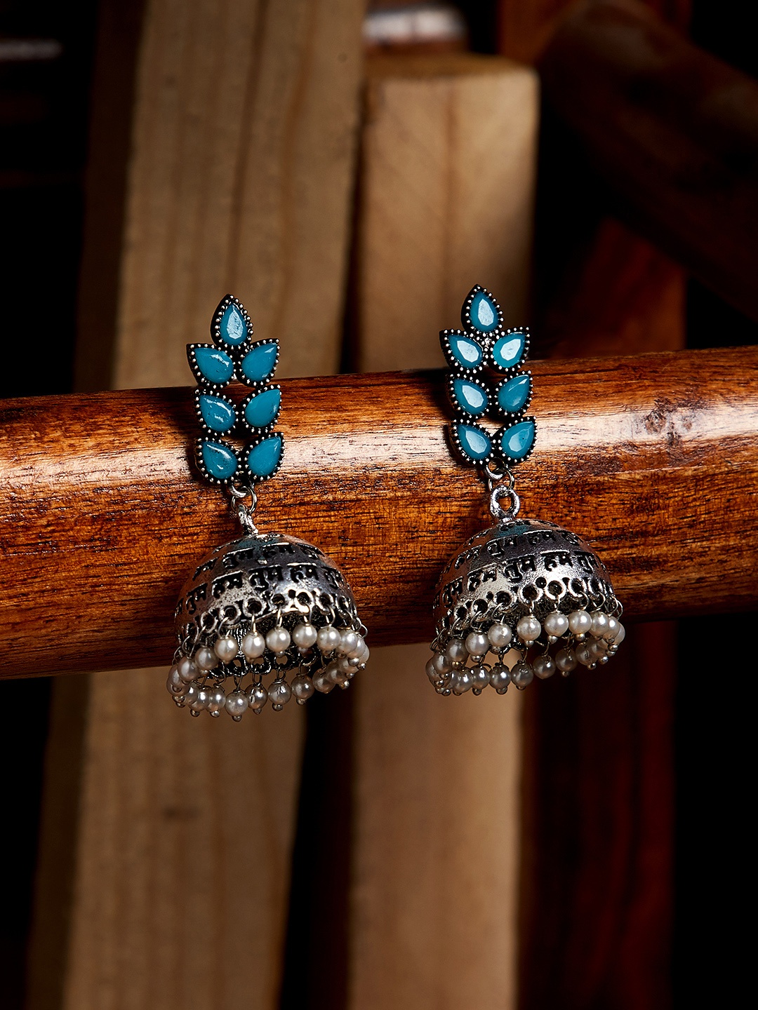 

PANASH Silver-Toned & Blue Contemporary Jhumkas