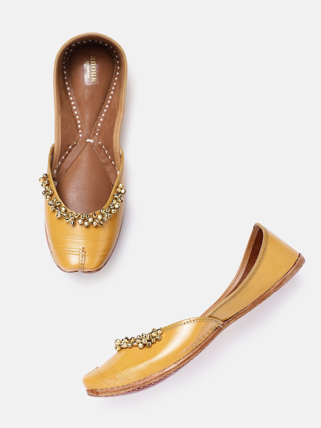 

Anouk Women Mustard Yellow & Gold-Toned Solid Ghungroo Detail Handmade Ethnic Mojaris
