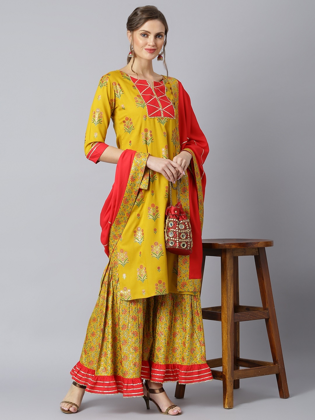 

Khushal K Women Yellow Ethnic Motifs Printed Kurta with Sharara & With Dupatta