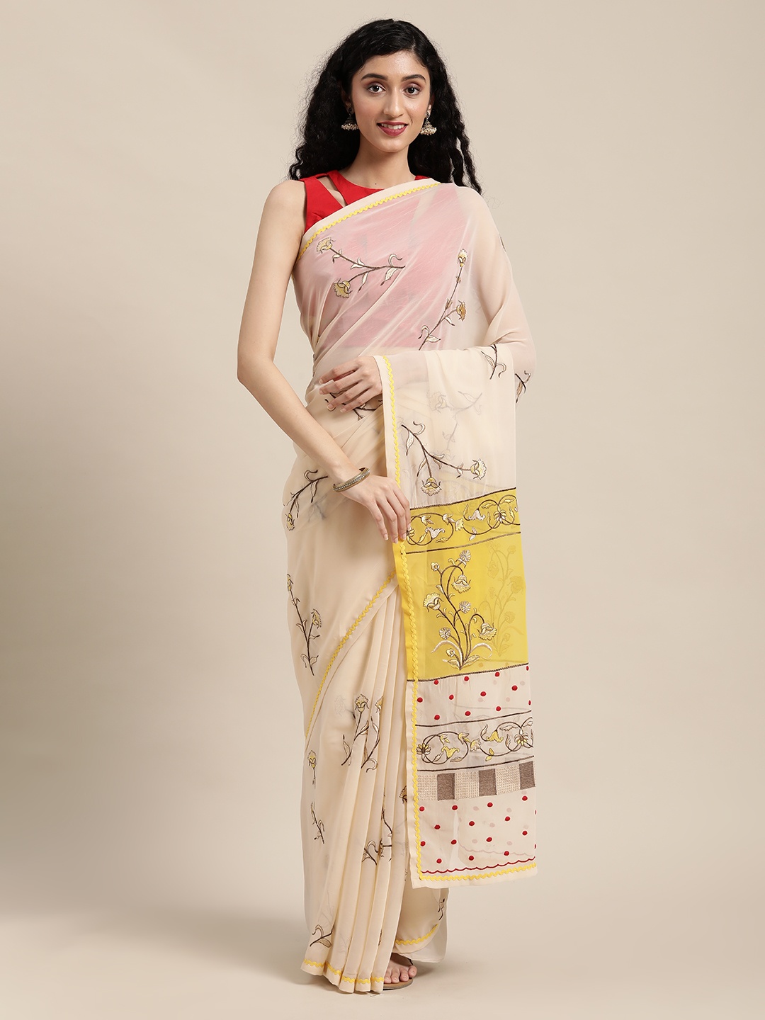 

Shaily Beige & Yellow Embroidered Georgette Saree