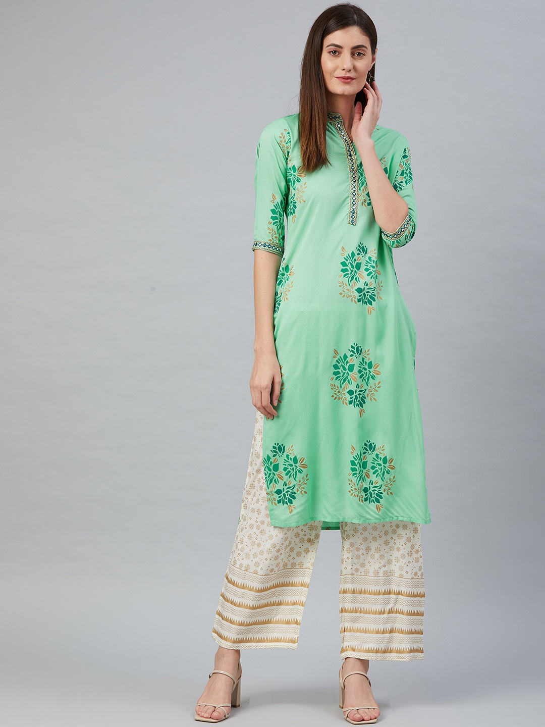 

Anubhutee Women Green & White Ethnic Motifs Printed Mirror Work Kurta with Palazzos