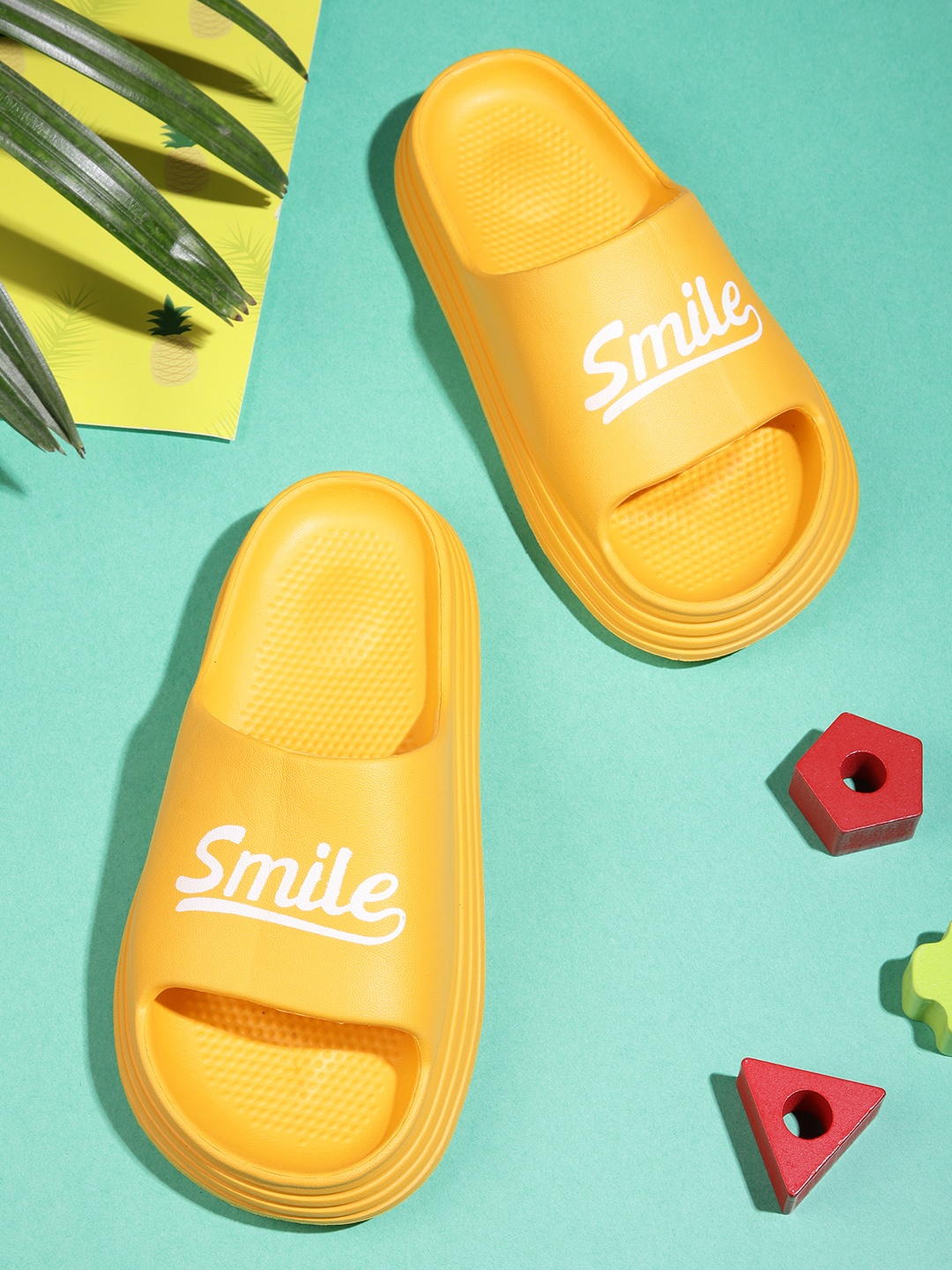 

Kook N Keech Women Yellow Solid Sliders