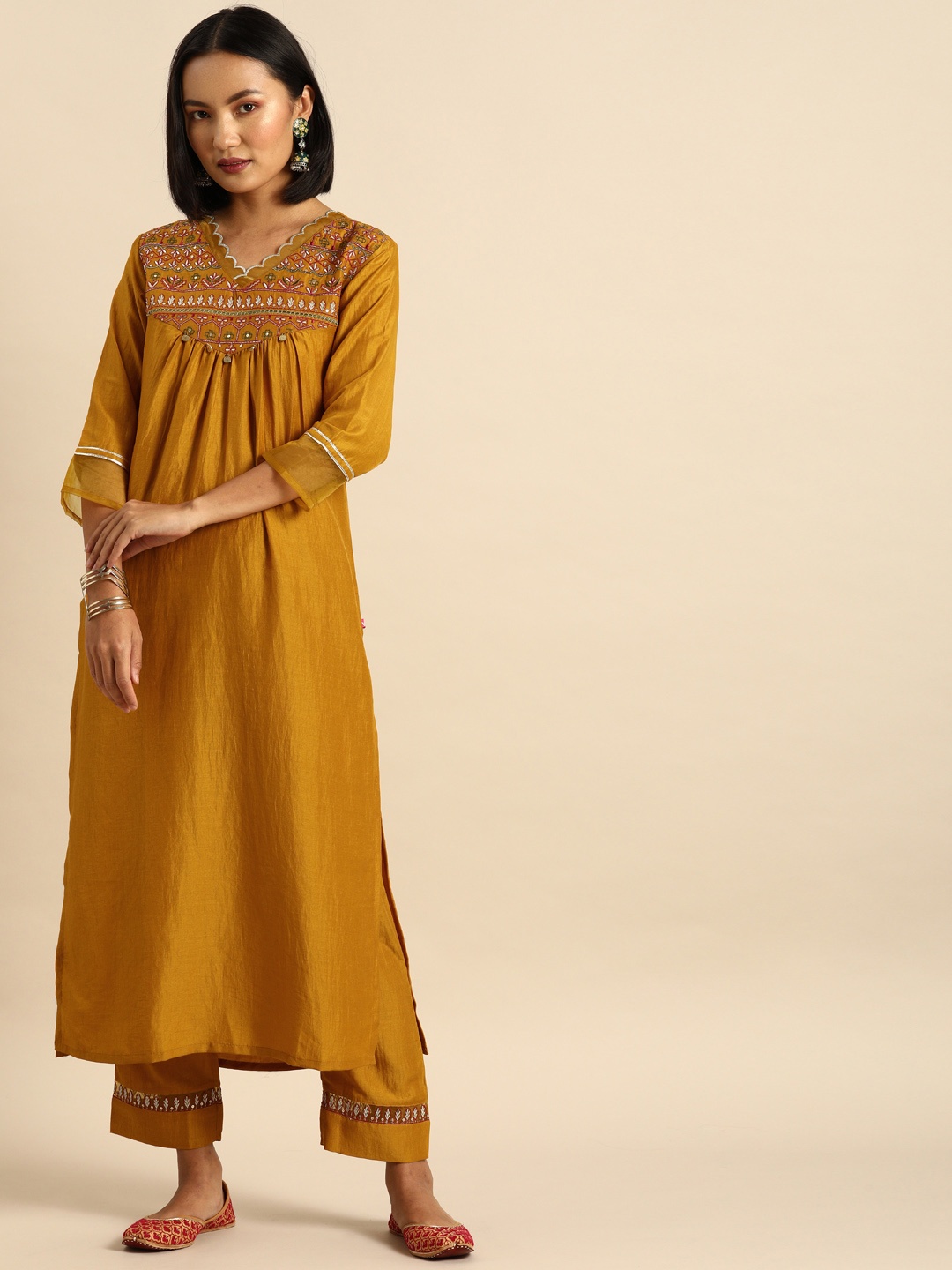 

Varanga Women Mustard Yellow Yoke Design Kurta with Trousers