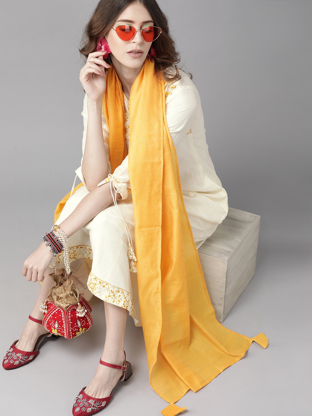 

Indo Era Tranquil Off White And Yellow Yoke Design Kurta Set