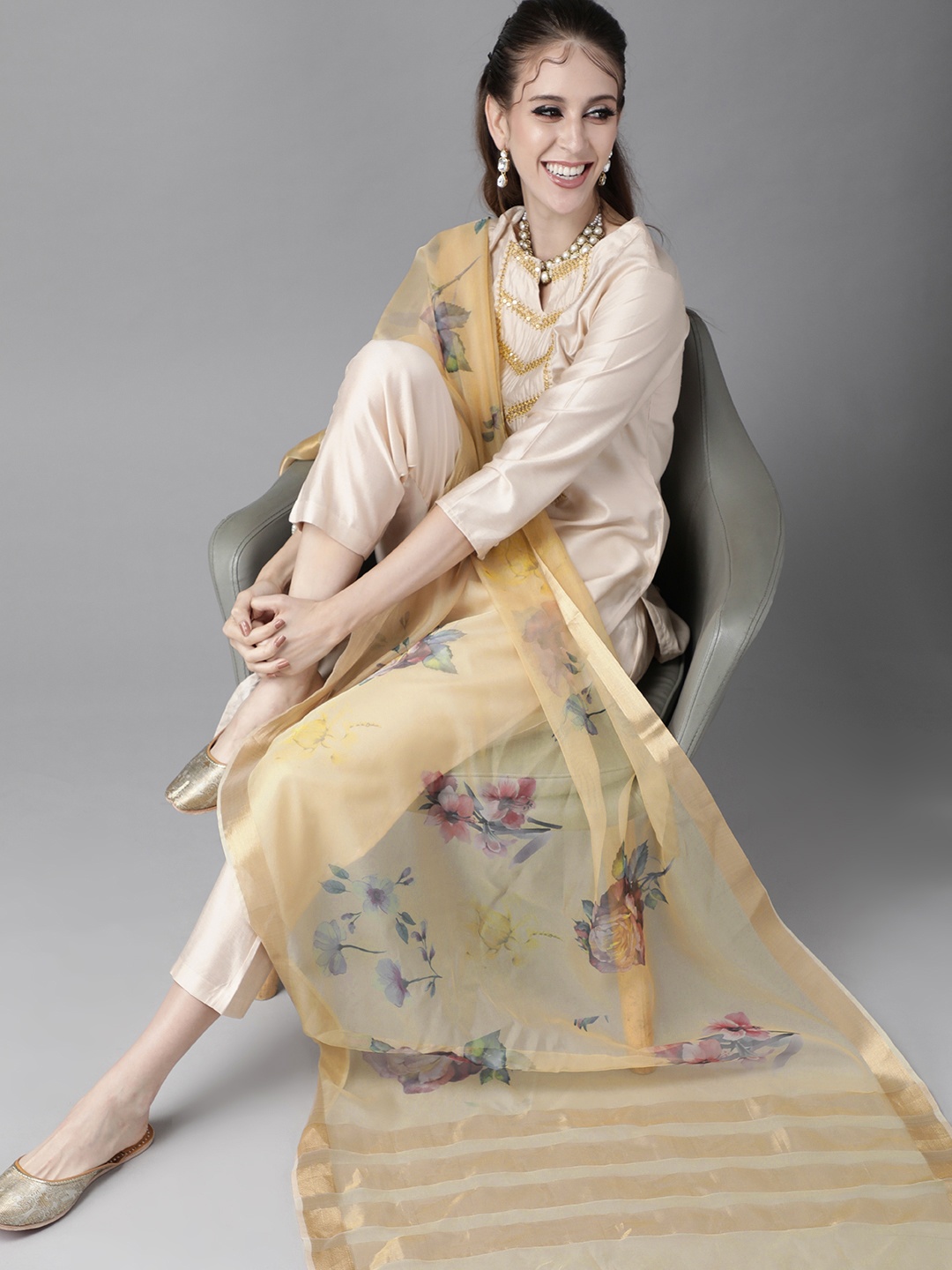 

Indo Era Striking Beige And Gold Yoke Design Kurta Set