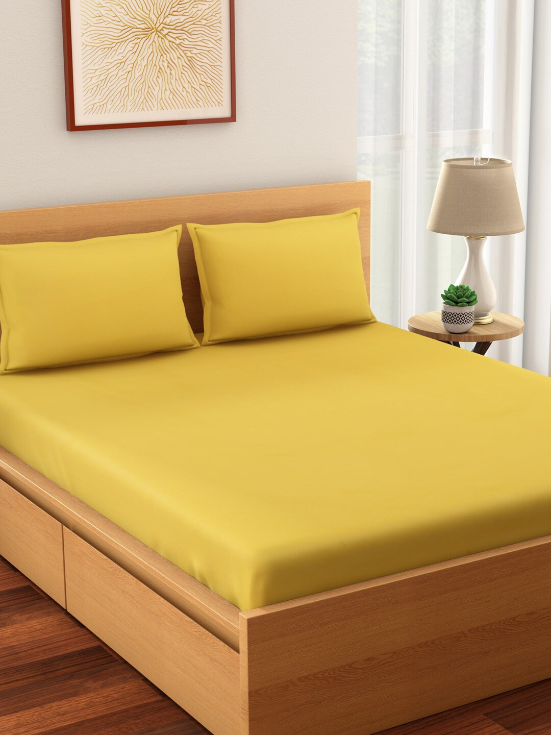 

Living scapes by Pantaloons Yellow Solid 210 TC Cotton 1 Queen Bedsheet with 2 Pillow Covers
