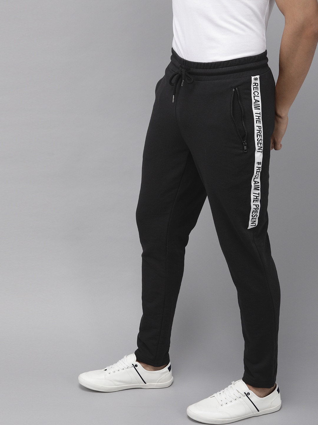 

Jack & Jones Men Black Solid Track Pants With Printed Detailing