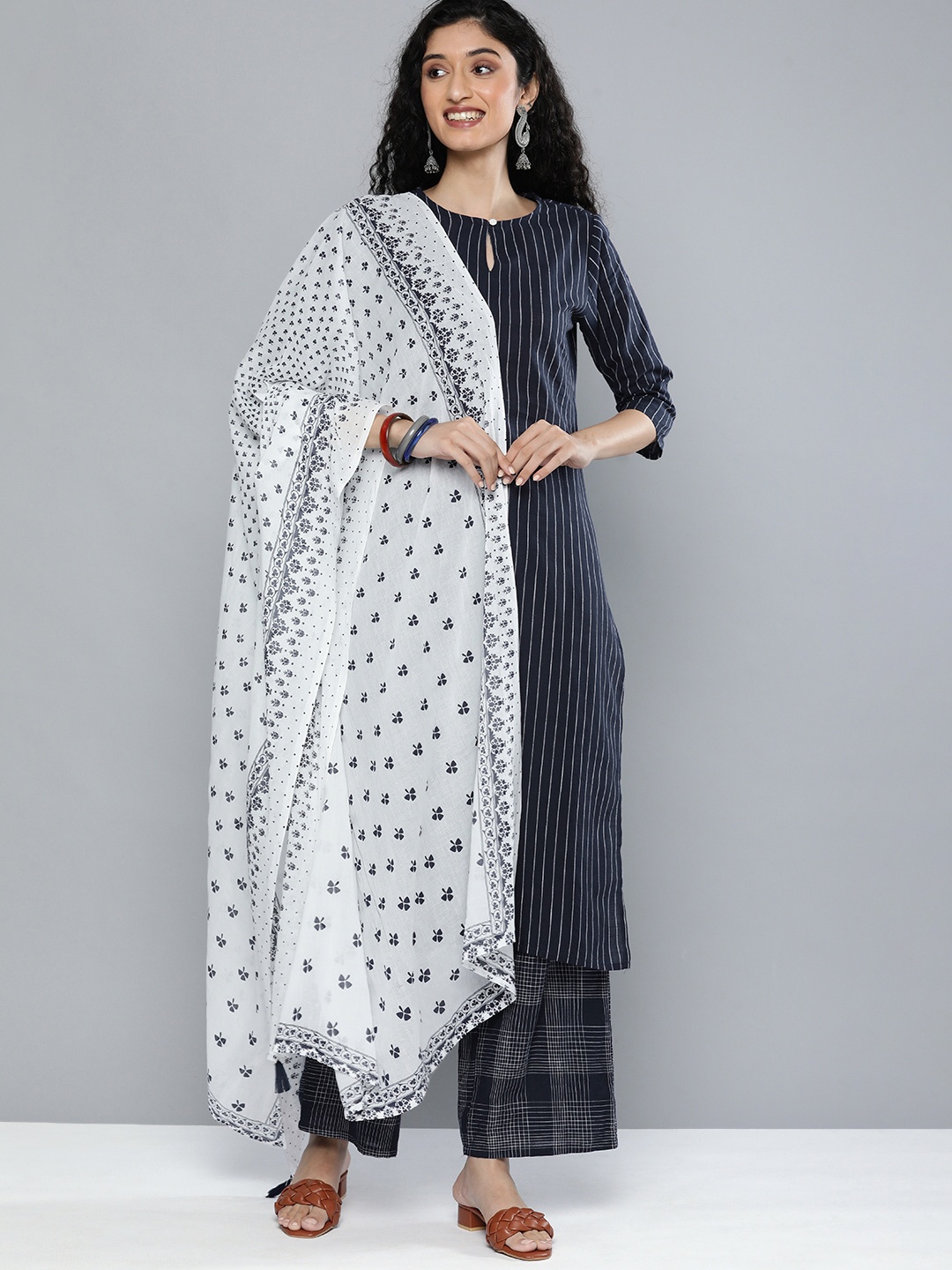 

Vishudh Women Navy Blue Printed Pleated Pure Cotton Kurti with Palazzos & With Dupatta