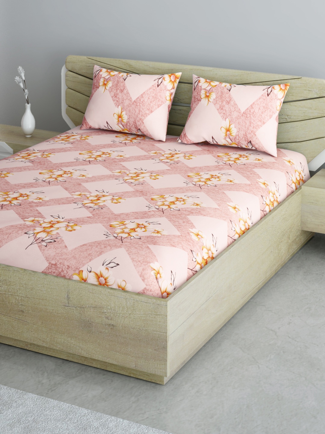 

Aura Pink & White Floral 144 TC 120 GSM Cotton Queen Bedsheet with 2 Pillow Covers