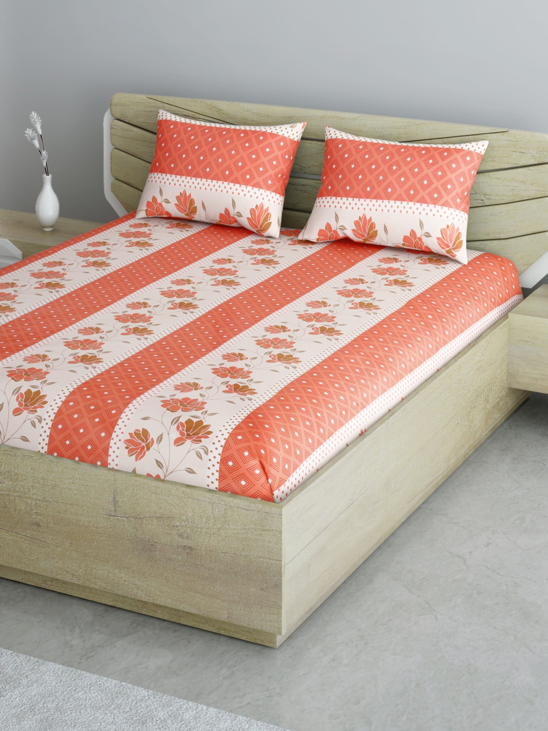 

Aura Pink & White Floral 144 TC 120 GSM Cotton Queen Bedsheet with 2 Pillow Covers