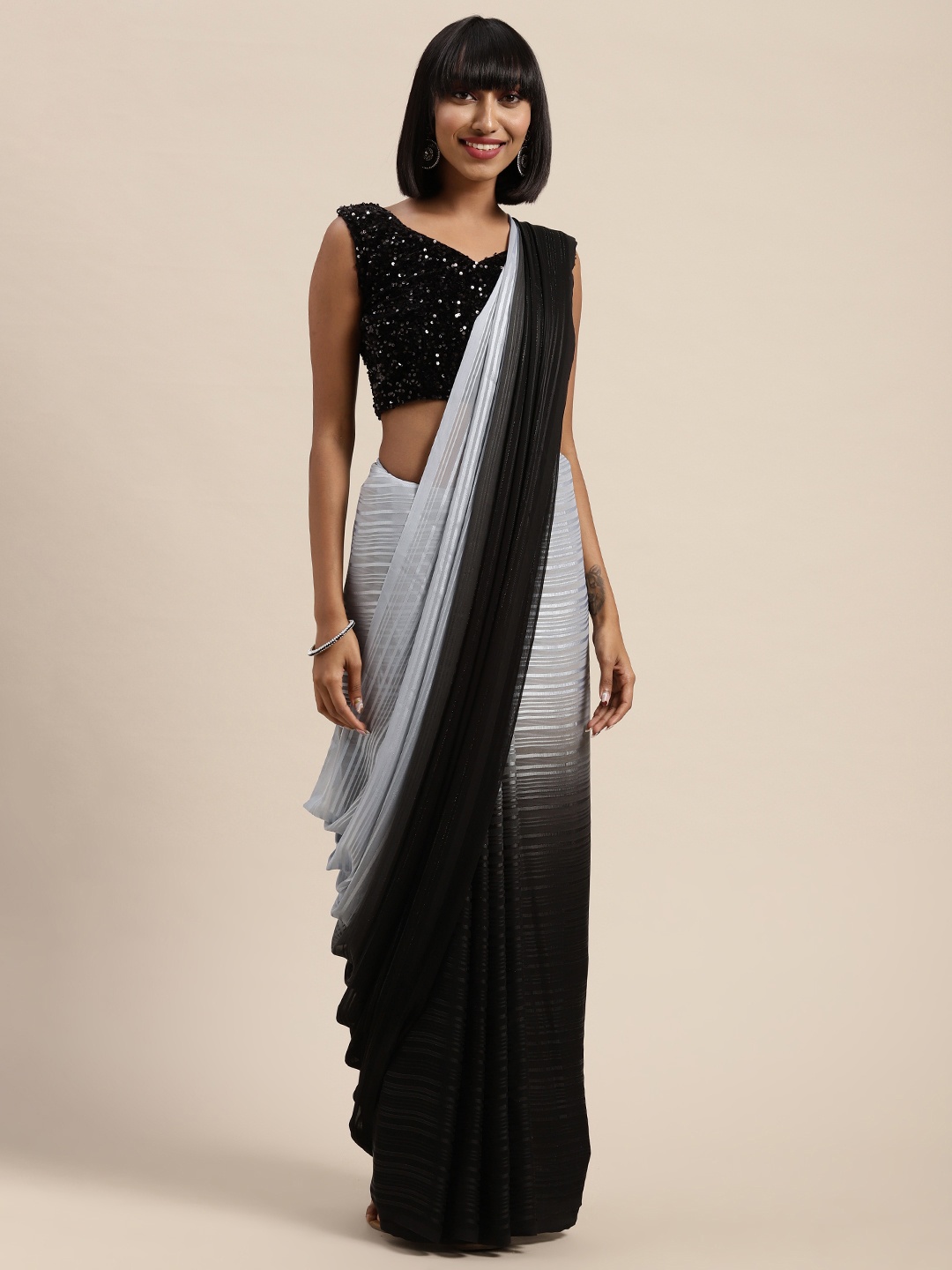 

Saree mall Grey & Black Pure Georgette Striped Saree