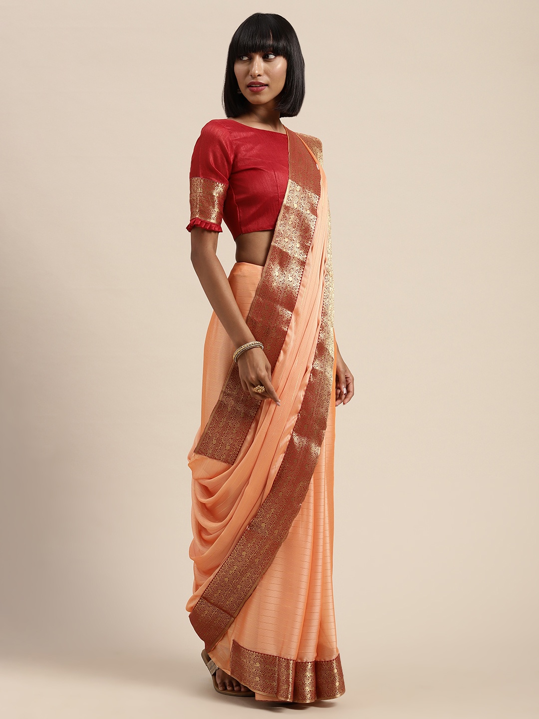 

Saree mall Peach-Coloured & Golden Pure Georgette Striped Saree