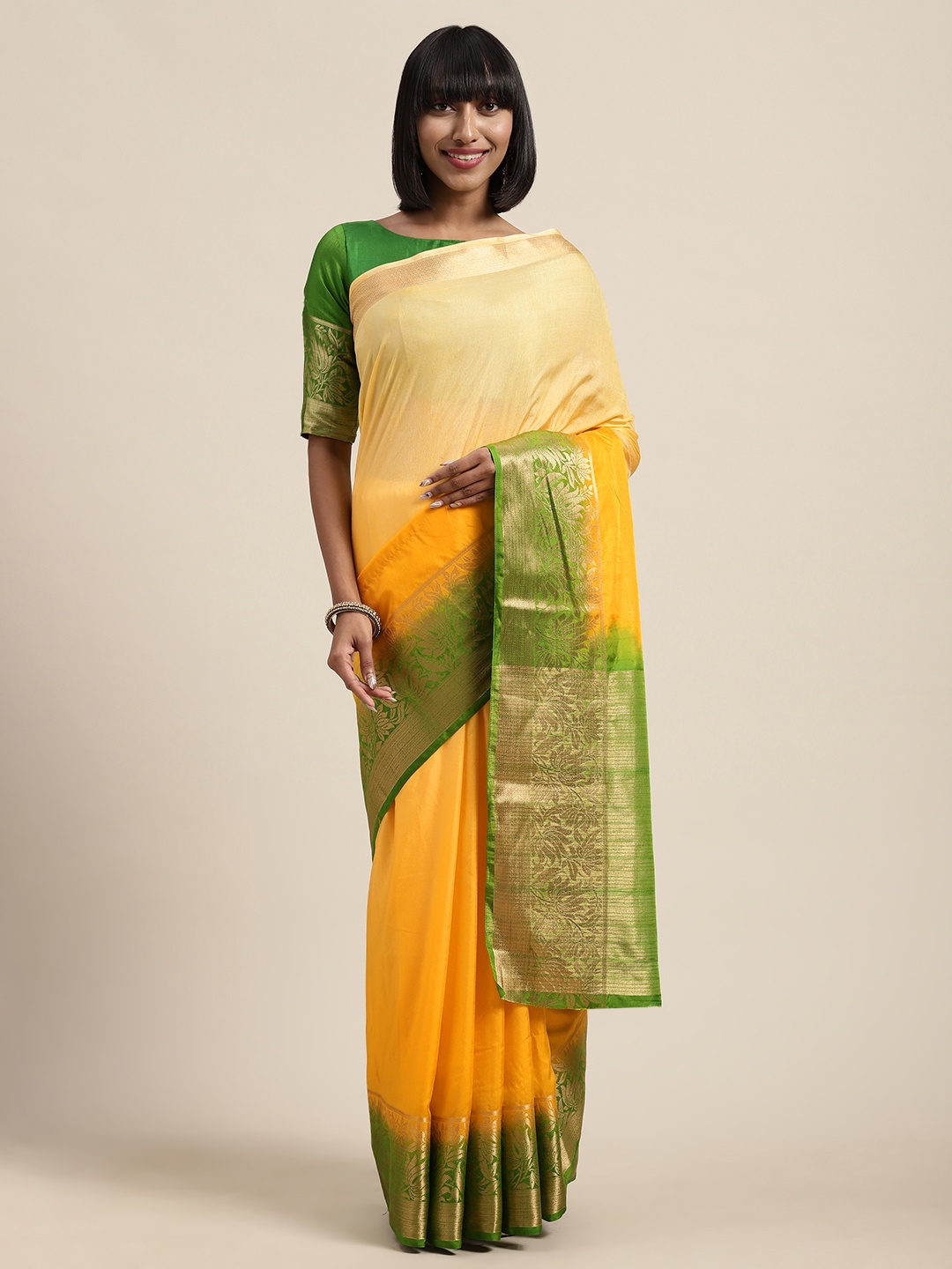 

Shaily Yellow & Green Silk Blend Solid Saree