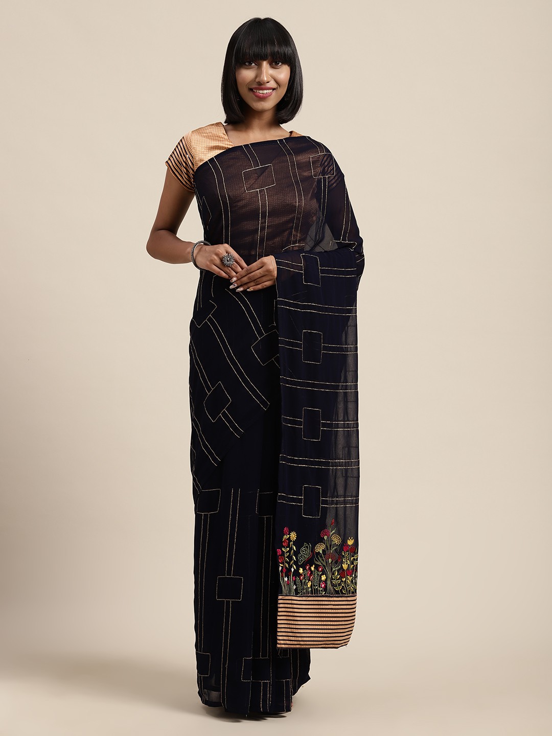 

Shaily Blue & Gold-Toned Embroidered Saree