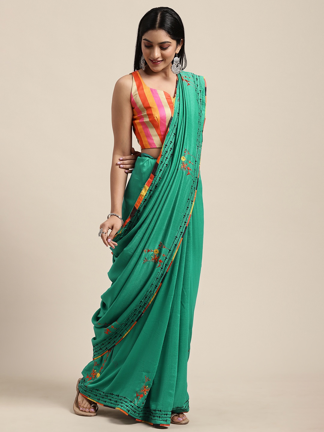 

Shaily Green Embroidered Silk Blend Saree