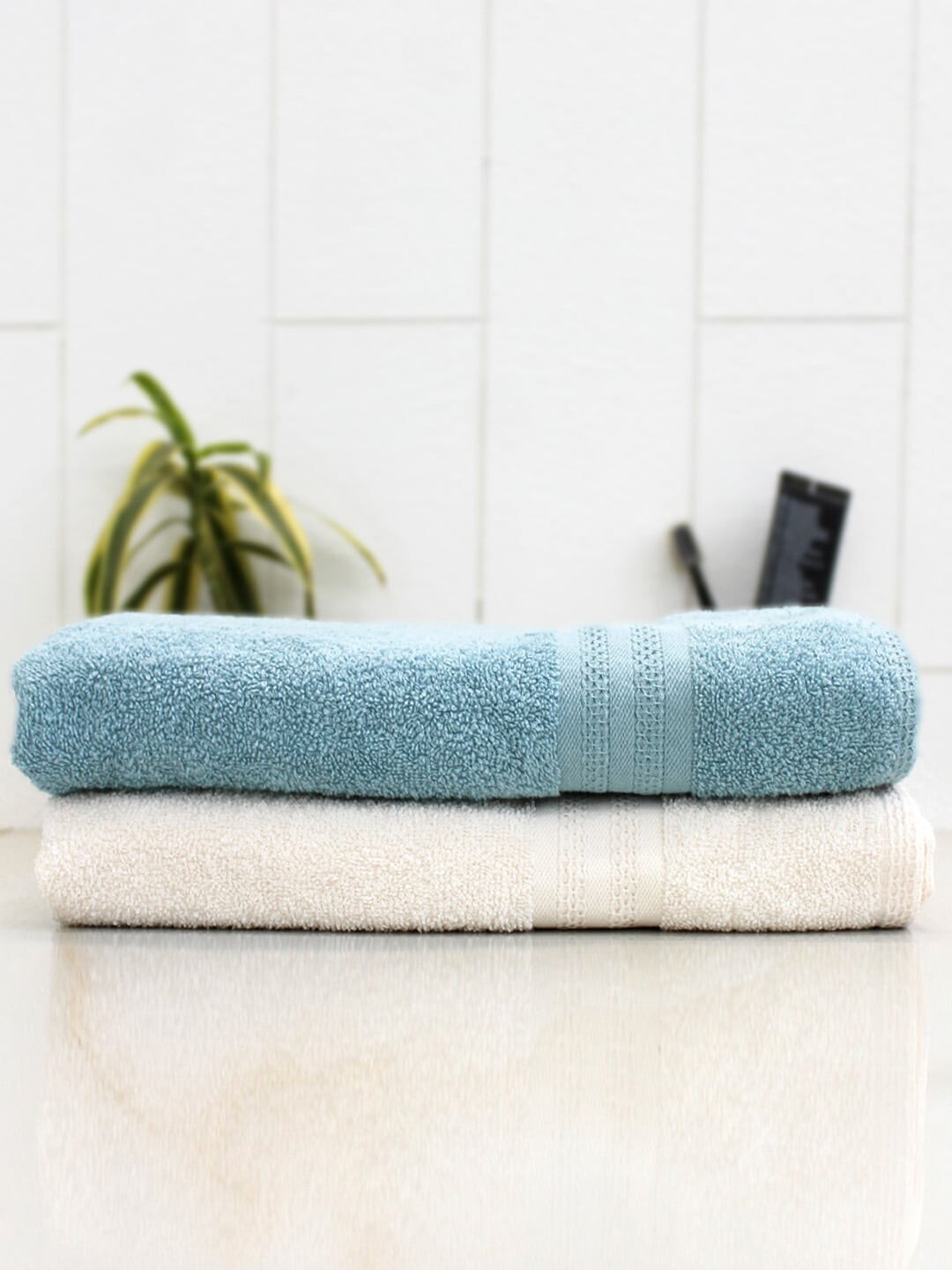 

AVI Living Off White & Turquoise Blue Set Of 2 Solid 400 GSM Quick Dry Cotton Anti-Microbial Bath Towel