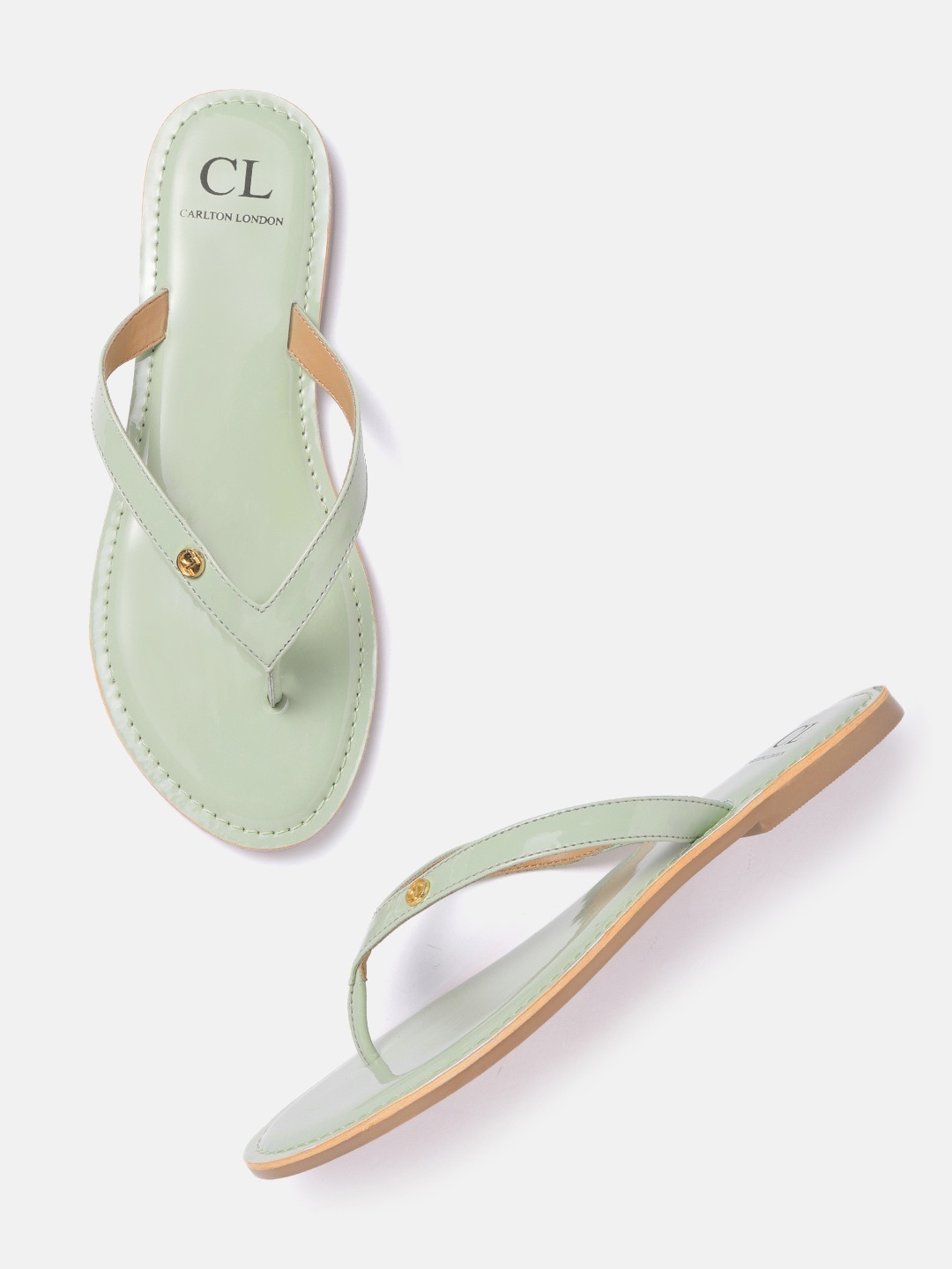 

Carlton London Women Green Solid Patent Finish Open Toe Flats