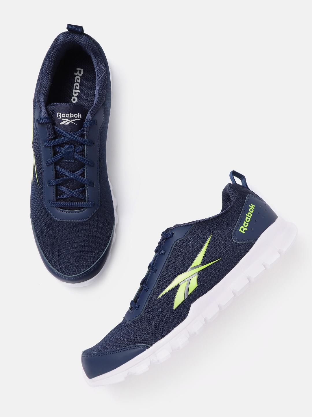 

Reebok Men Blue Woven Design Revolution Vector Training or Gym Shoes