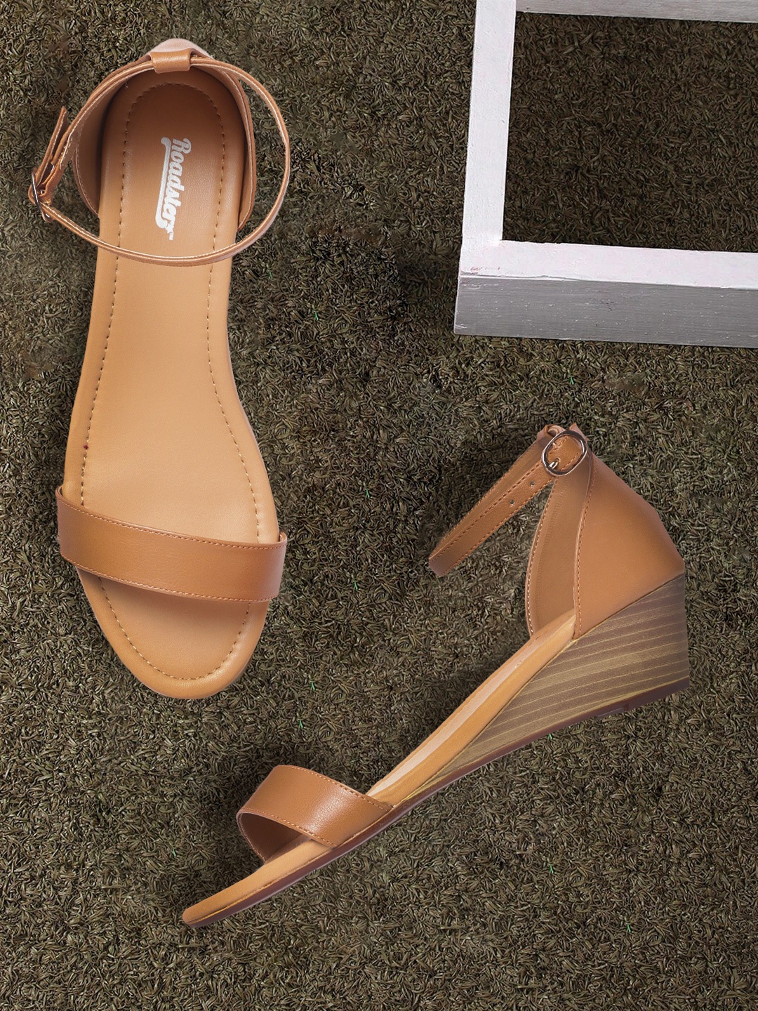

Roadster Women Beige Solid Wedges