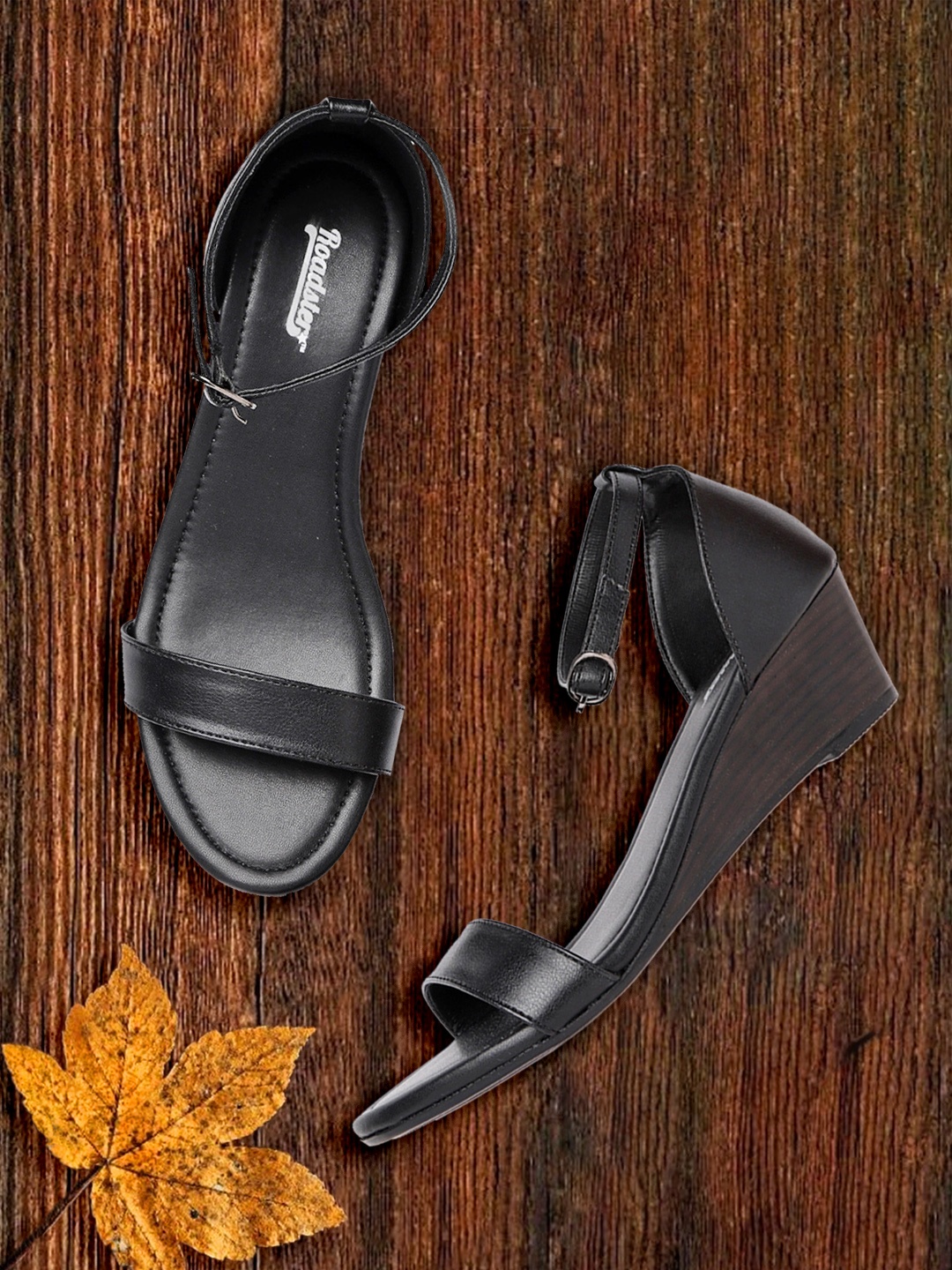 

Roadster Women Black Solid Mid-Top Wedges