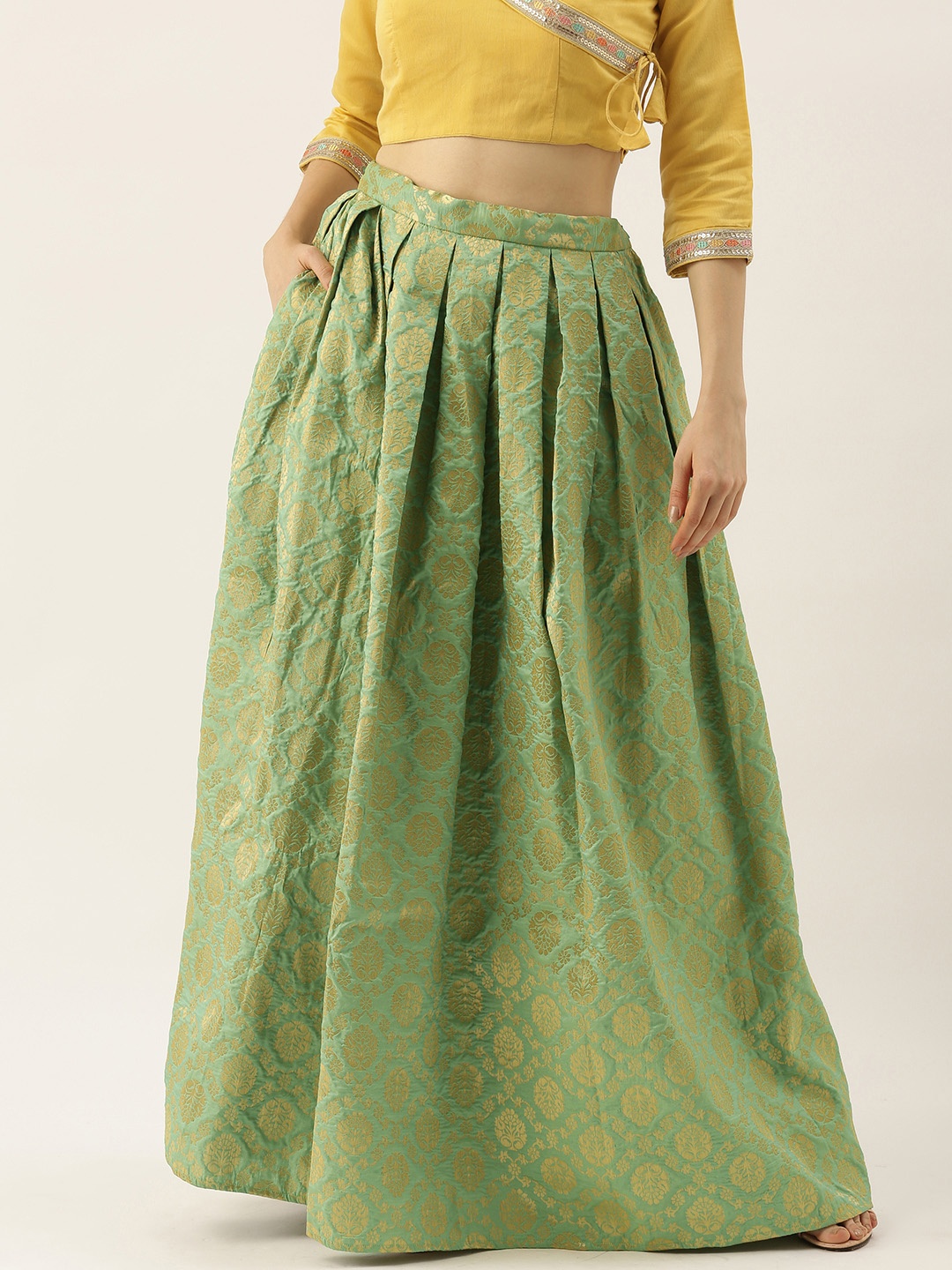 

Ethnovog Made To Measure Green Gold- Coloured Brocade Box Pleated Skirt