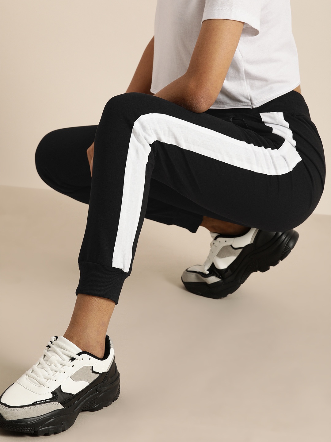 

DILLINGER Women Black Slim Fit Solid Joggers with Side Stripes
