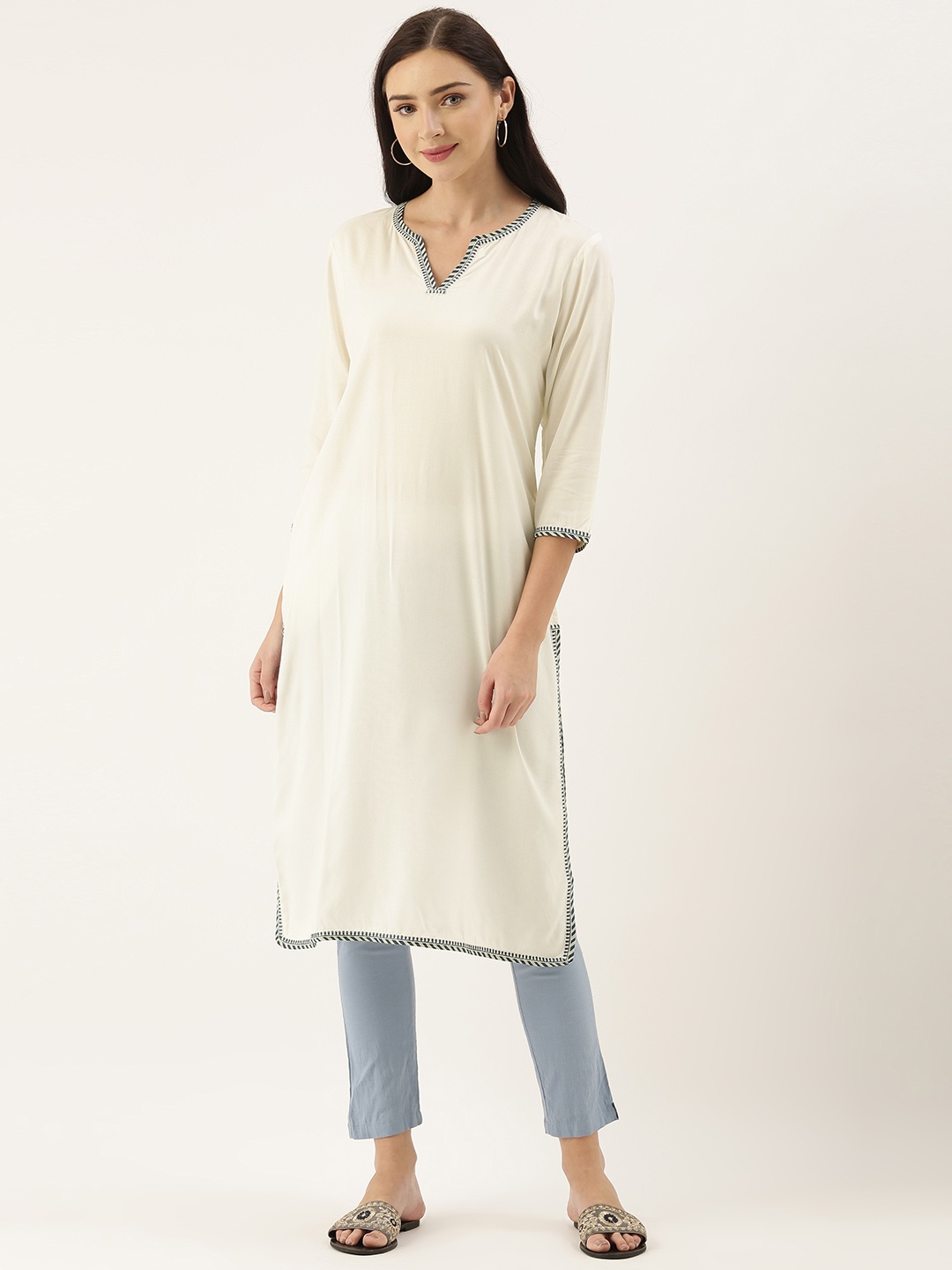 

AMUKTI Women Off White & Blue Embroidered Kurta