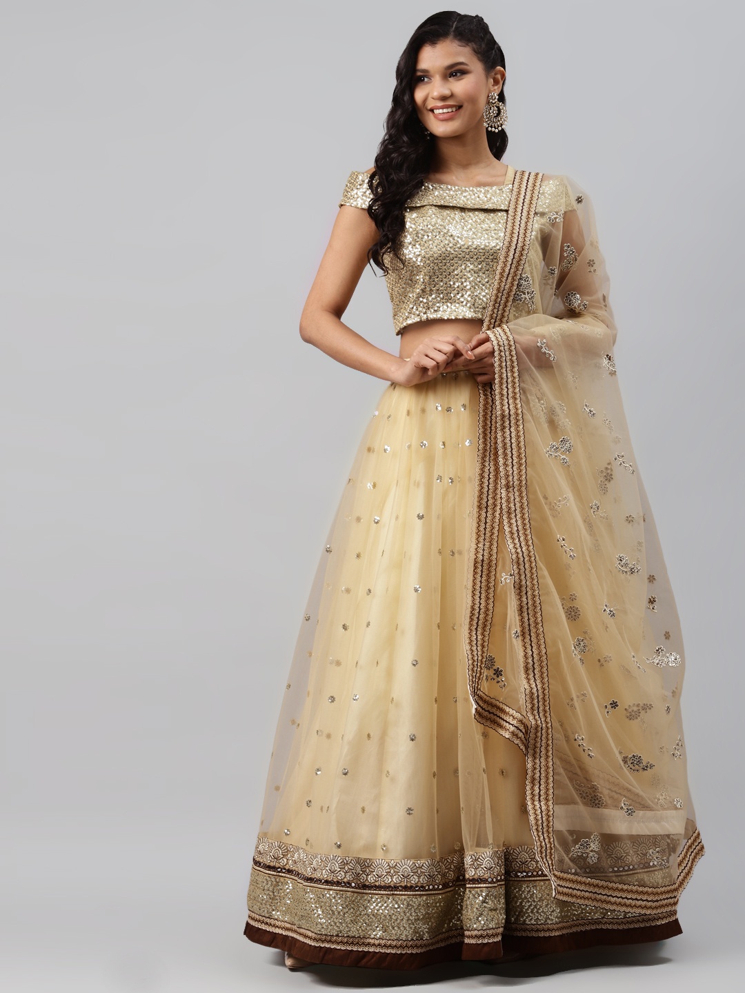 

Readiprint Fashions Cream-Coloured & Gold-Toned Embellished Semi-Stitched Lehenga & Unstitched Blouse with Dupatta