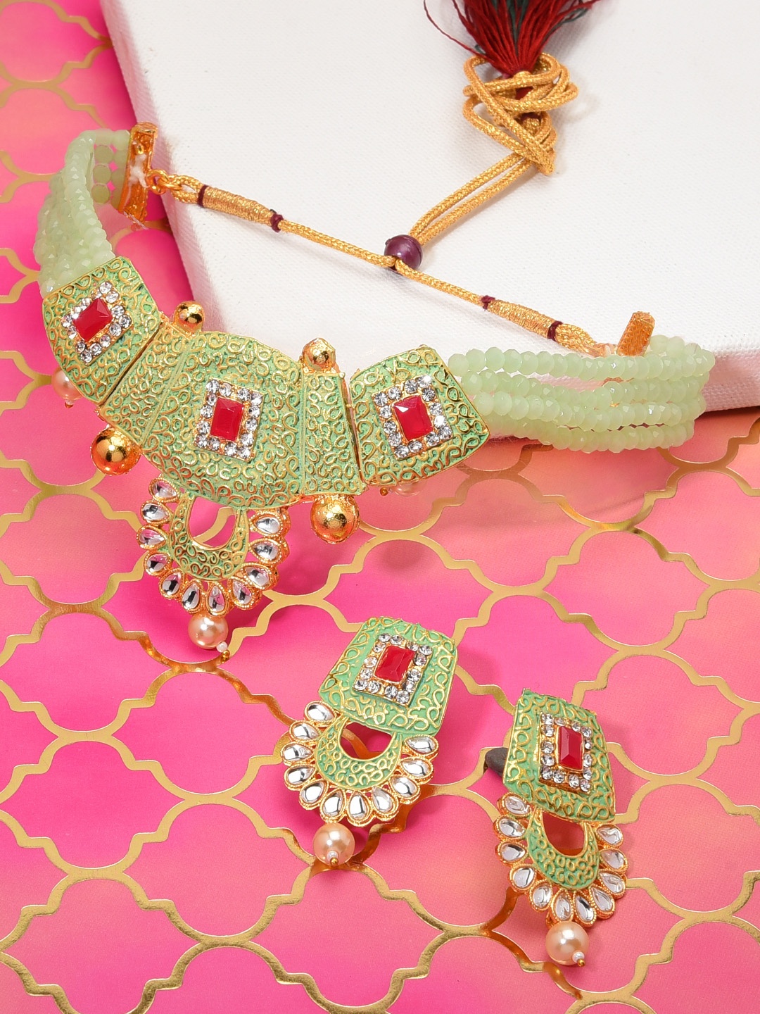 

Zaveri Pearls Green Gold-Plated Enamelled Kundan Studded Jewellery Set