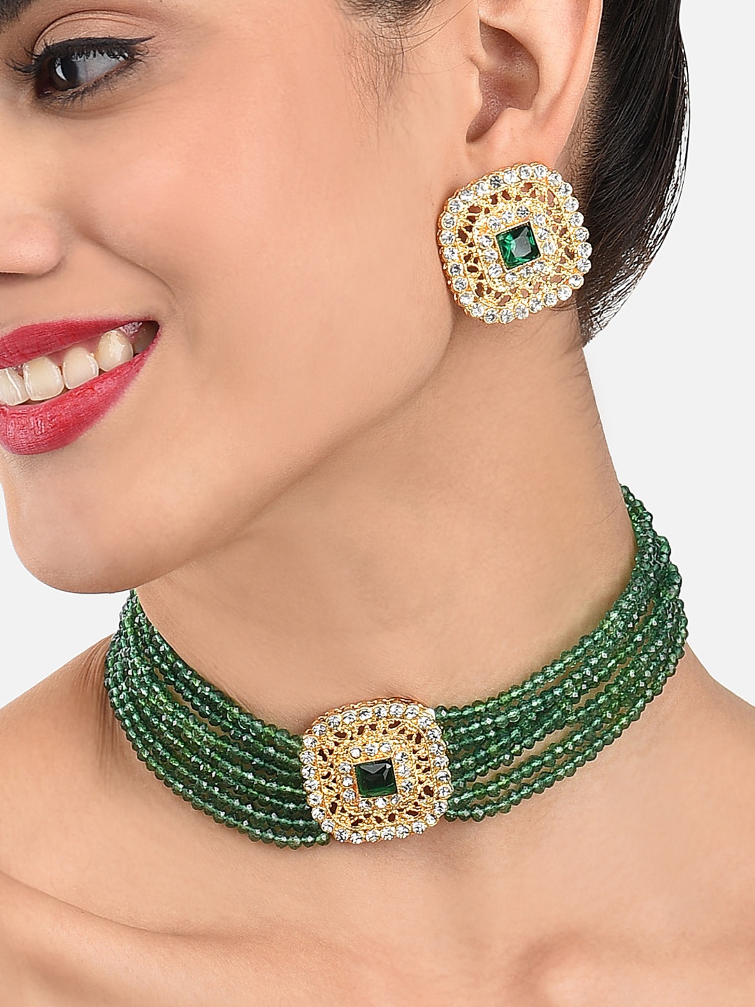 

Zaveri Pearls Gold Toned & Green Crystal Beads Jewellery Set