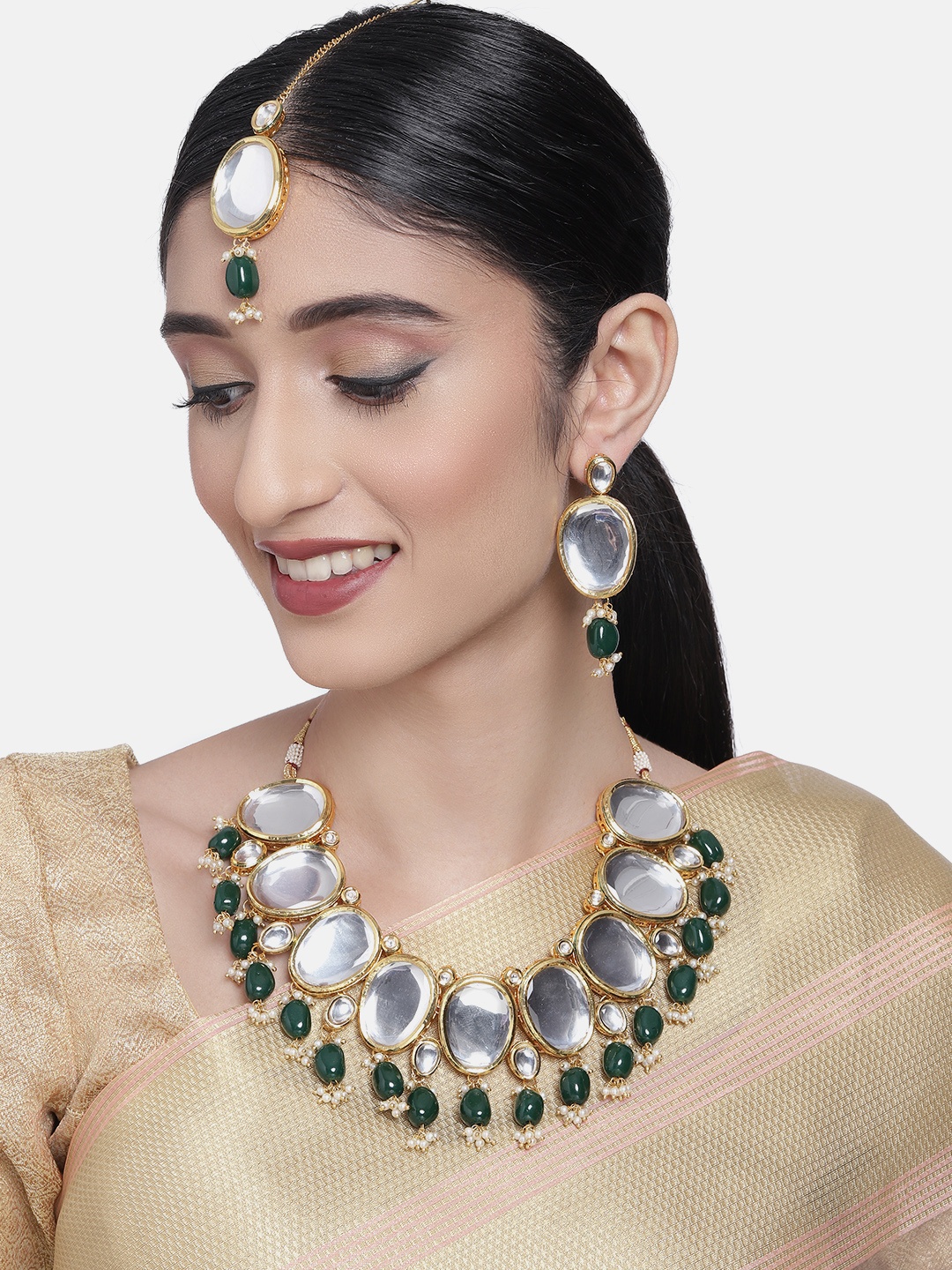 

Zaveri Pearls White & Green Gold-Plated Kundan Studded Jewellery Set