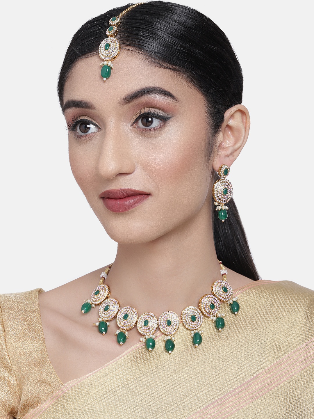 

Zaveri Pearls White & Green Gold-Plated Studded Jewellery Set