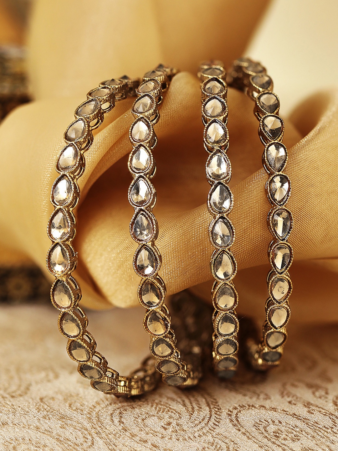 

Rubans Set of 4 24K Gold-Plated Beige Kundan-Studded Handcrafted Bangles