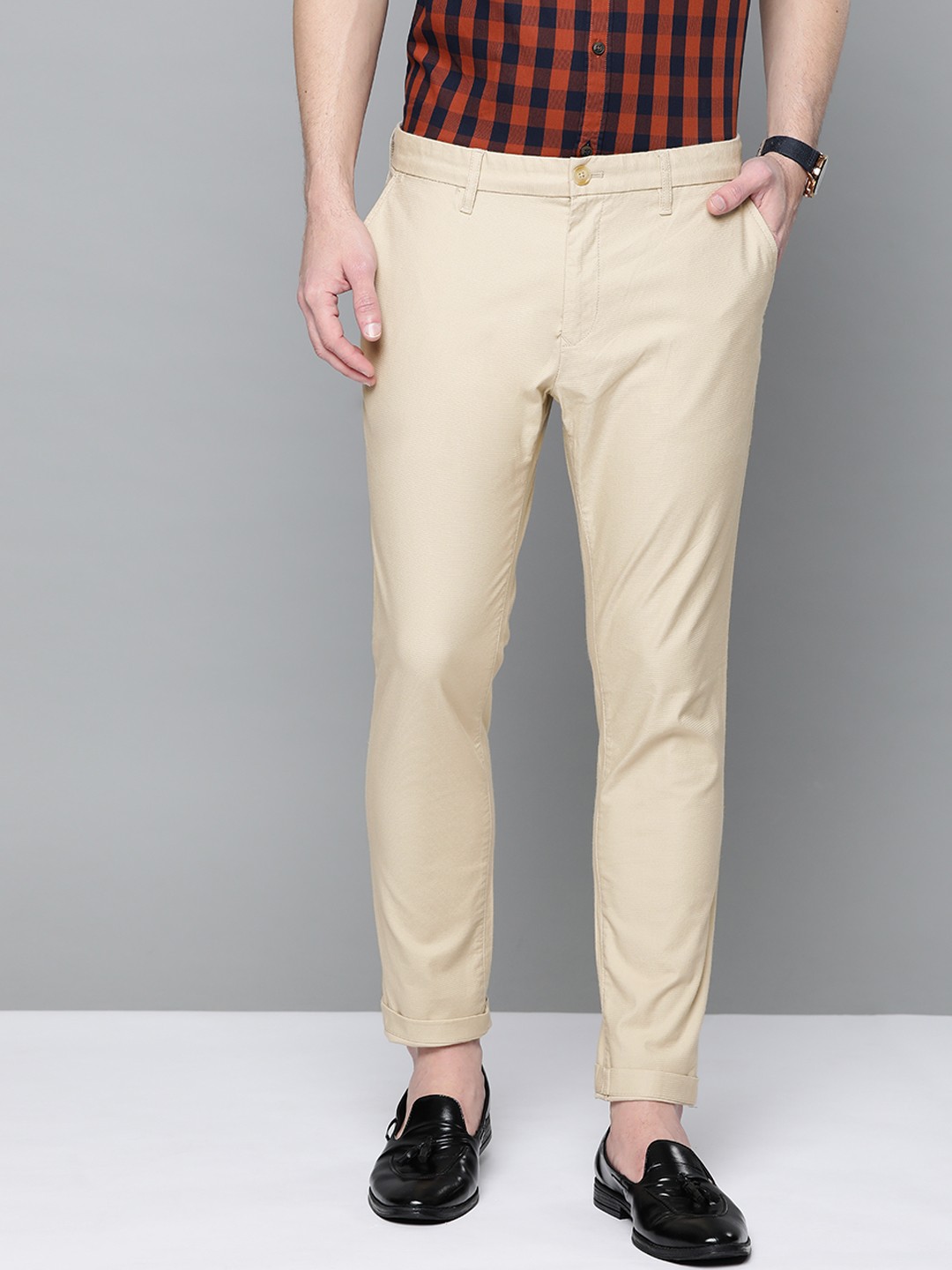 

Indian Terrain Men Cream-Coloured Self-Striped Comfort Fit Trousers