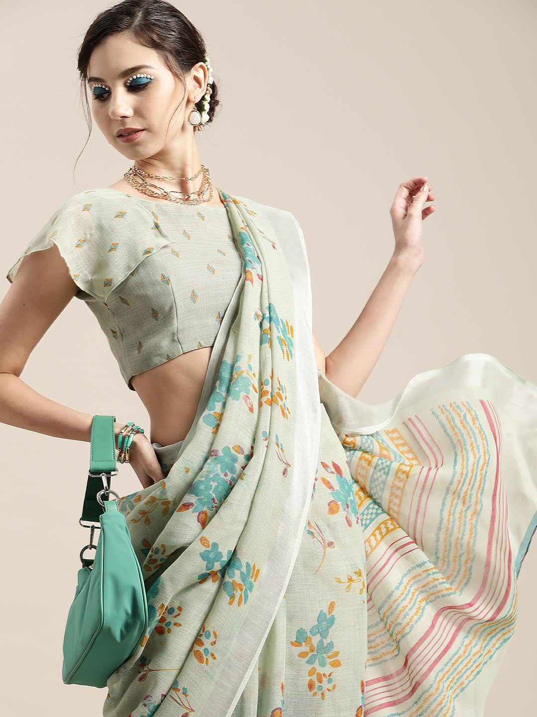 

Saree mall Floral Linen Blend Saree with Woven Design border, Sea green
