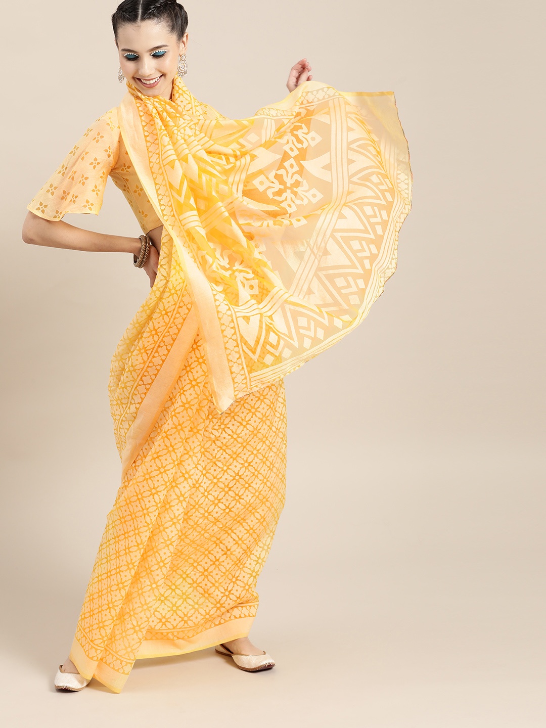 

Saree mall Floral Saree with Printed border, Yellow