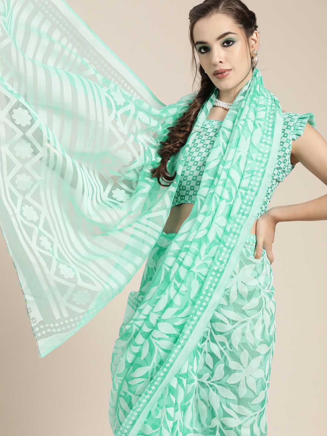 

Saree mall Sea Green & White Floral Brasso Chanderi Sarees