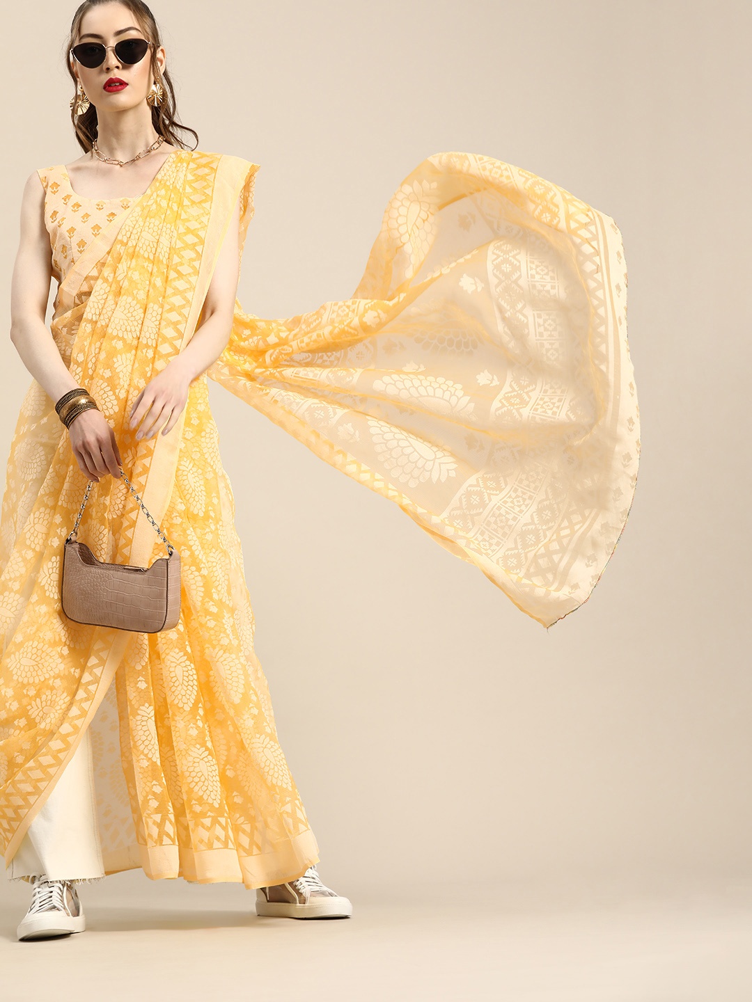 

Saree mall Ethnic Motifs Saree with Sleek border, Yellow