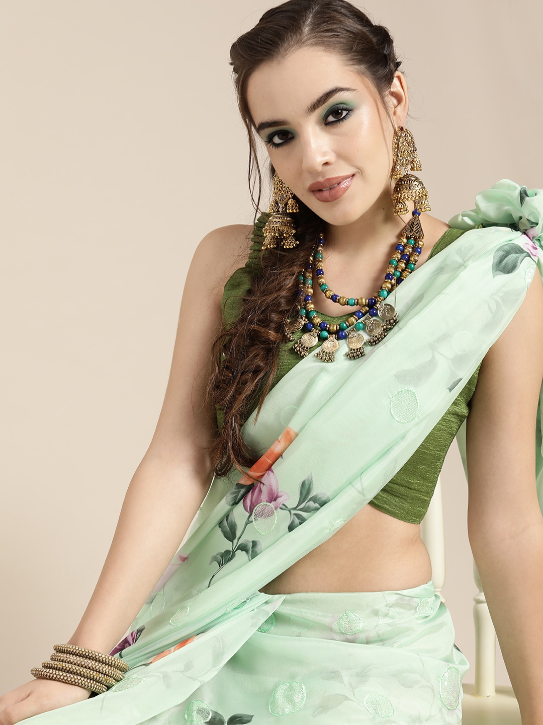 

Saree mall Green Floral Sequinned Sarees