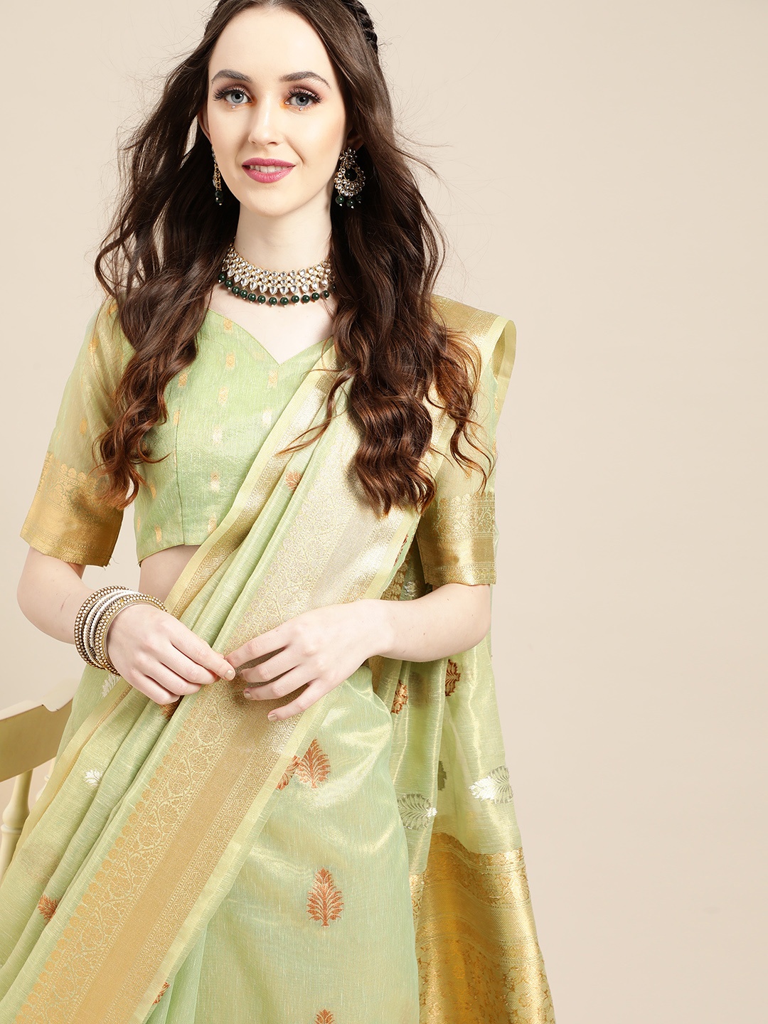 

Saree mall Floral Silk Blend Saree with Woven Design border, Green